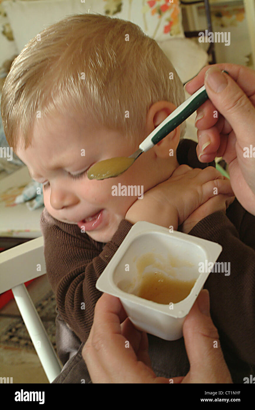 INFANT EATING Stock Photo