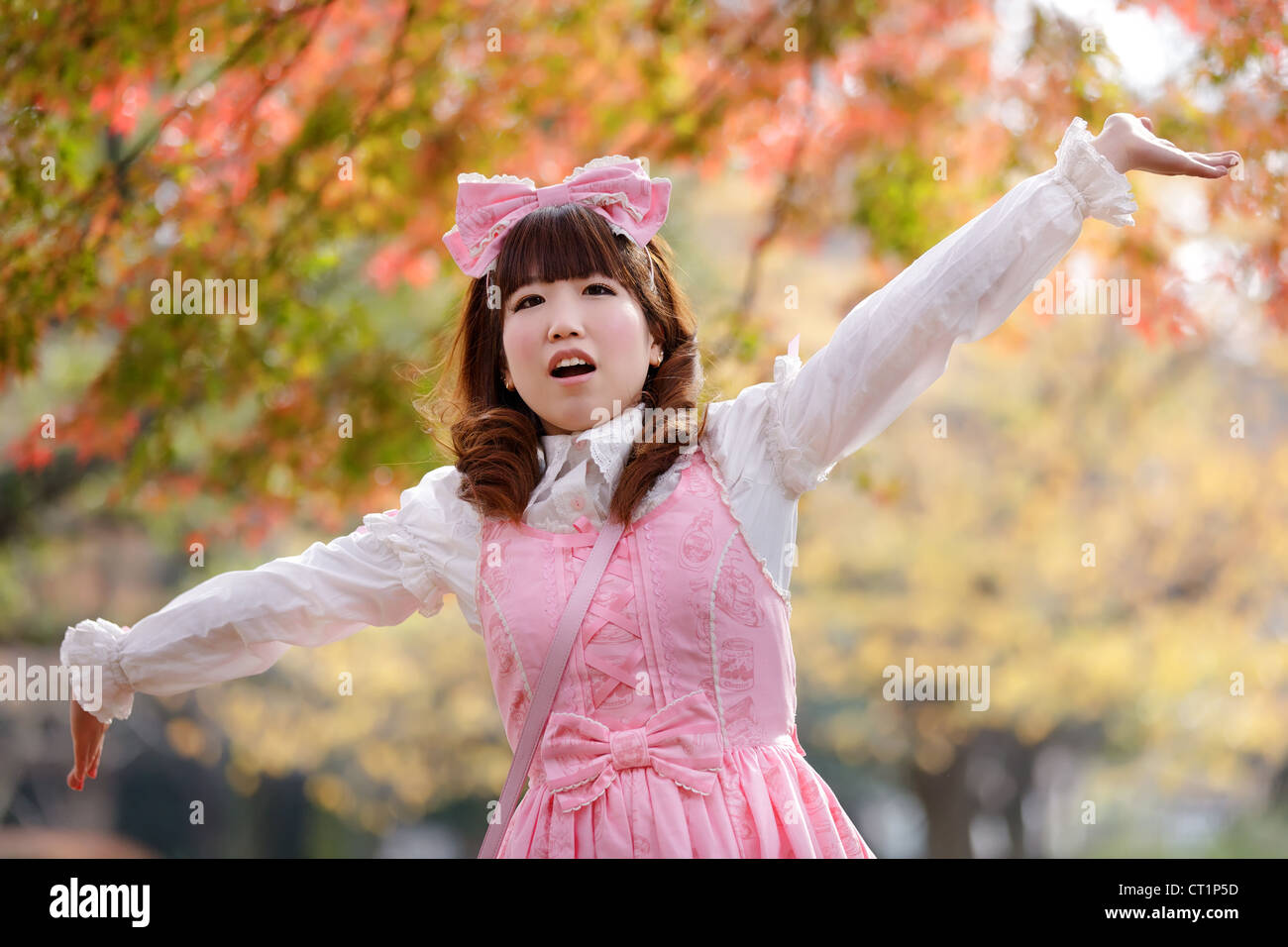 japanese lolita portrait in park during fall season, Tokyo Stock Photo