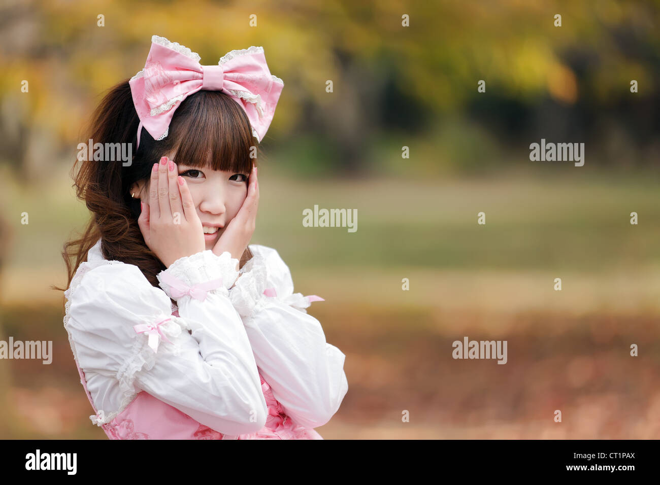 japanese in sweet lolita cosplay in harajuku park, Tokyo Stock Photo