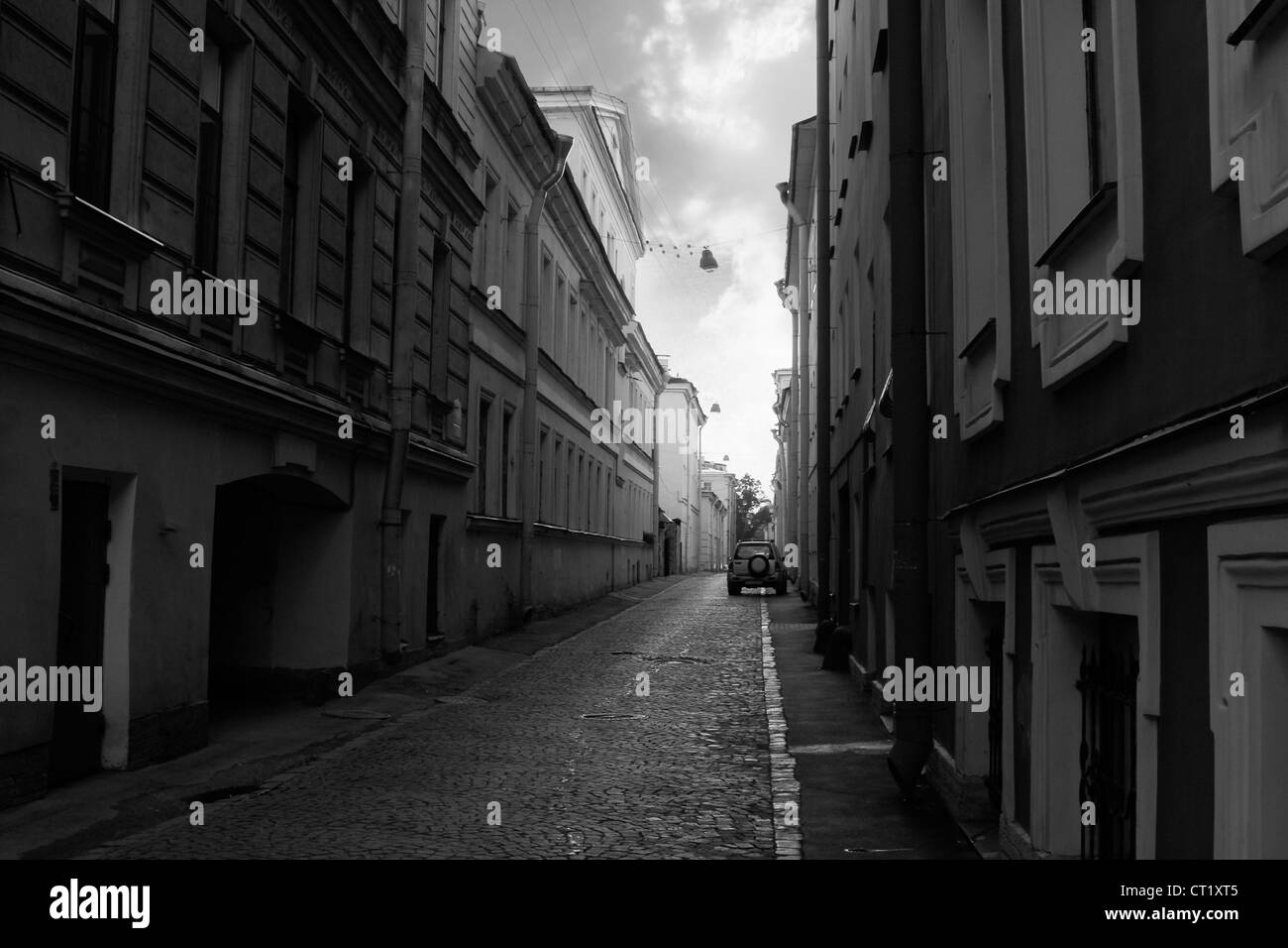 Narrow paved street Black and White Stock Photos & Images - Alamy