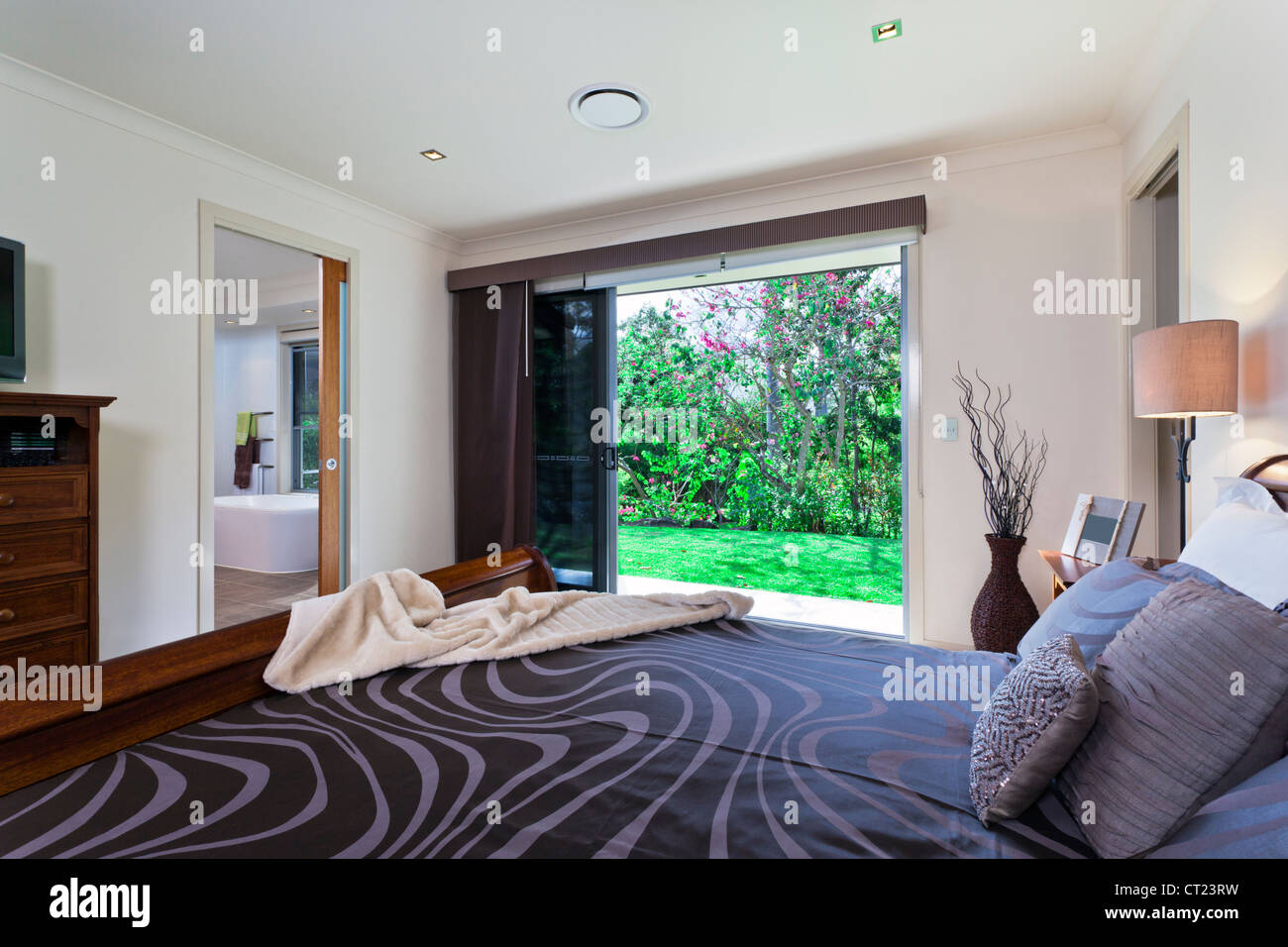 Stylish Master Bedroom In Luxury Australian Mansion Stock