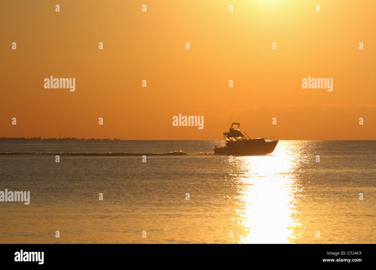 Lake Erie Sunset with Boat. From Catawba Island State Park, Catawba