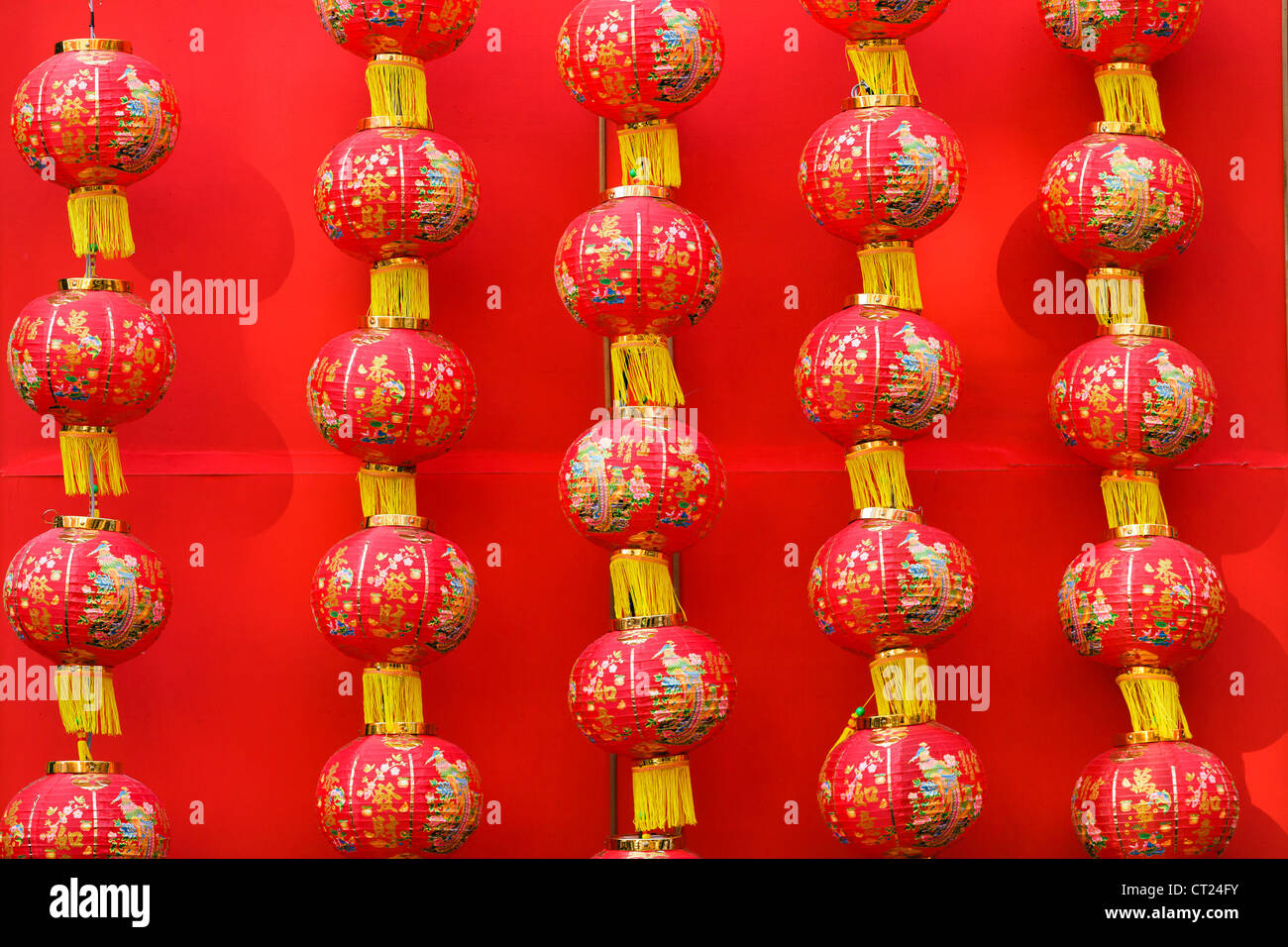 traditional chinese lantern hanging on red background Stock Photo - Alamy