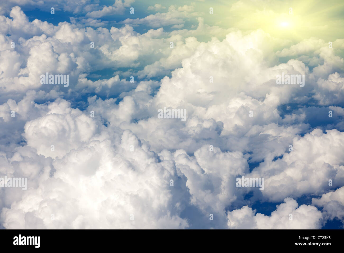 sunlight and cloudscape view from airplane Stock Photo