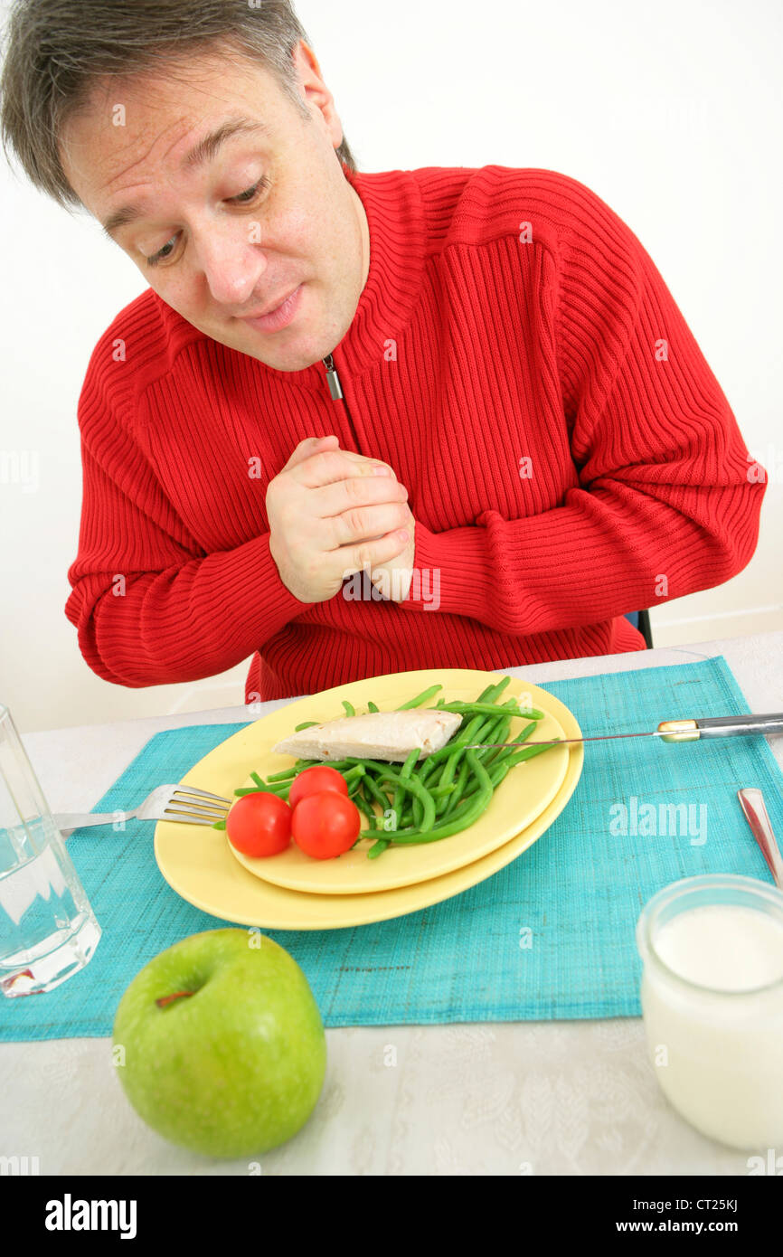 MAN EATING MEAT Stock Photo Alamy