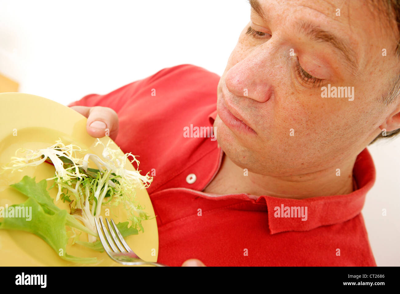 MAN EATING SALAD Stock Photo Alamy