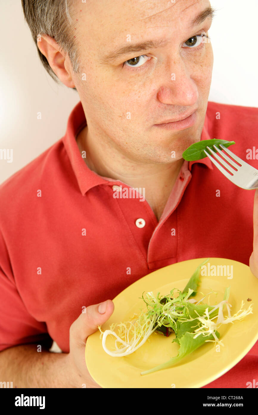MAN EATING SALAD Stock Photo Alamy