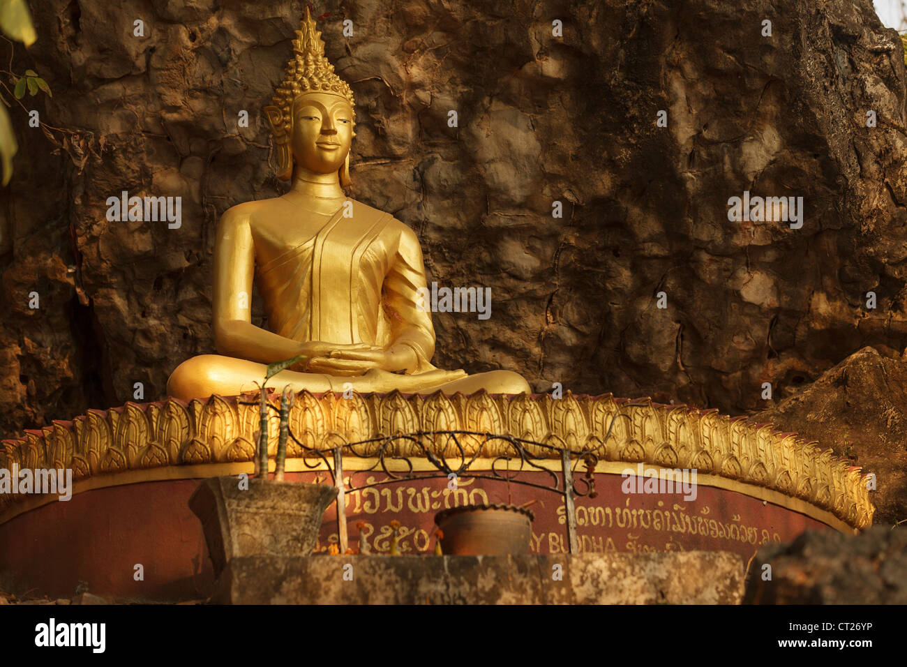 golden buddha statue in Laos temple Stock Photo Alamy