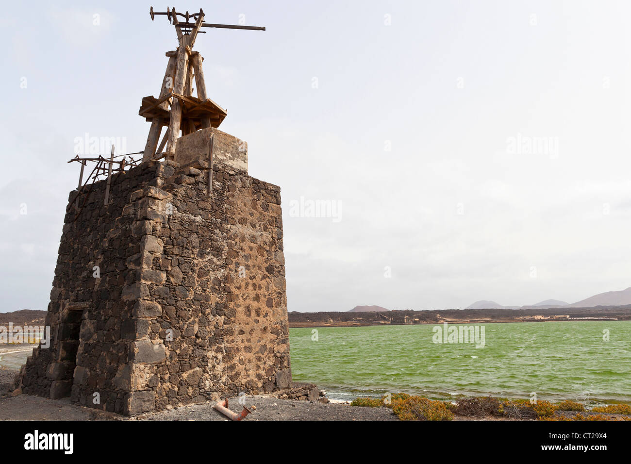 Lanzarote, Old windmill at the Salinas De Janubio salt basins - Lanzarote, Canary Islands, Spain, Europe Stock Photo