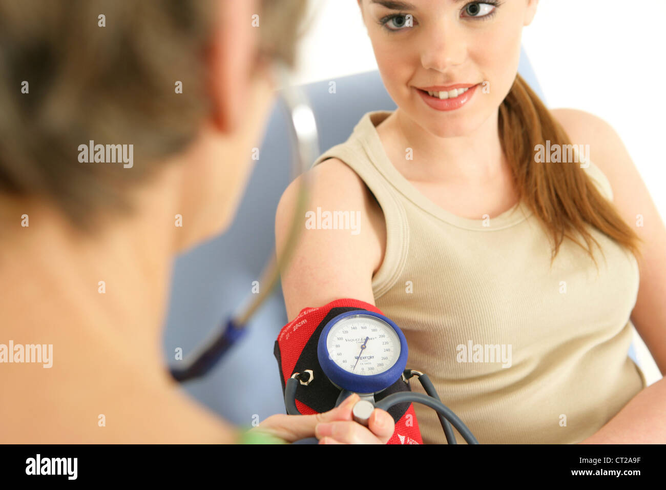 BLOOD PRESSURE, WOMAN Stock Photo Alamy