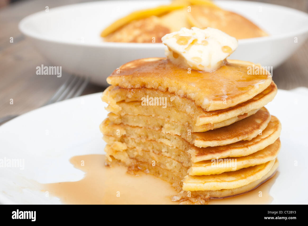 Homemade Pancakes With Butter and Warm Maple Syrup Stock Photo