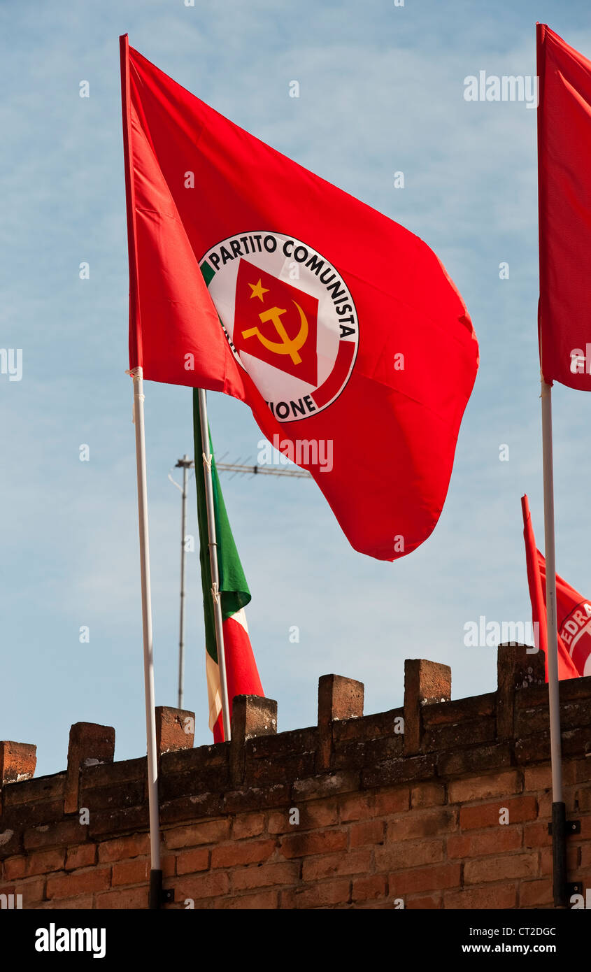 The red flag of the PRC (Partito della Rifondazione Comunista) flies for May Day on the Giudecca, Venice, Italy. Stock Photo