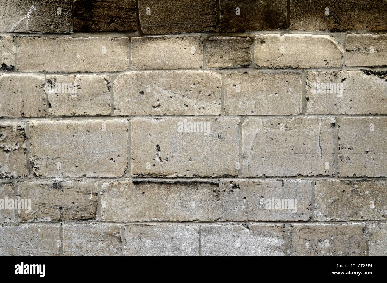 Stone building wall / detail of weathered sandstone - Bath, Somerset. Stock Photo