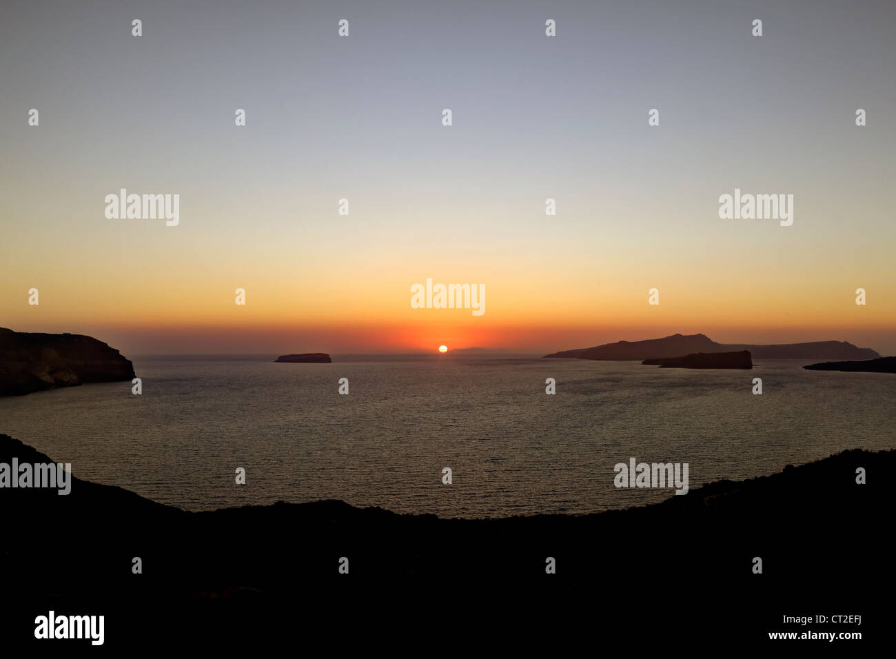 Sunset over the Caldera of Santorini, Cyclades, Greece Stock Photo