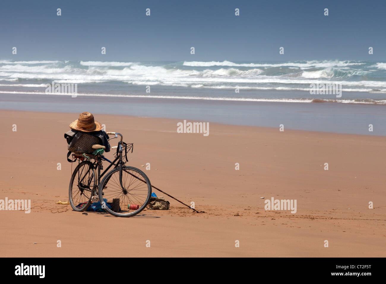 A local fisherman's bicycle on the beach near Agadir on the Atlantic coast, morocco, Africa Stock Photo