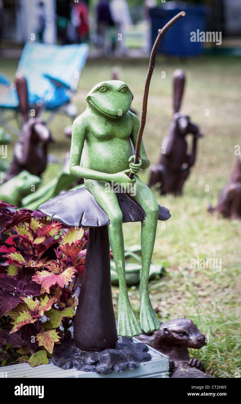 https://c8.alamy.com/comp/CT2H65/froggy-goes-a-fishing-at-the-hampton-court-flower-show-CT2H65.jpg