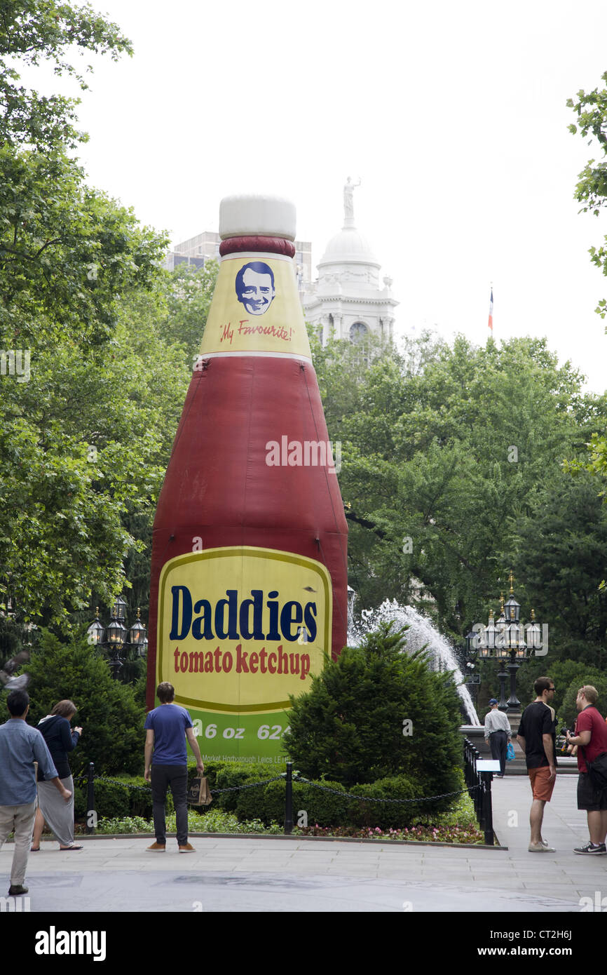 30 ft. inflatable 'Daddies Ketchup' by Paul McCarthy (2001) at City Hall Park, NYC in 2012 Stock Photo