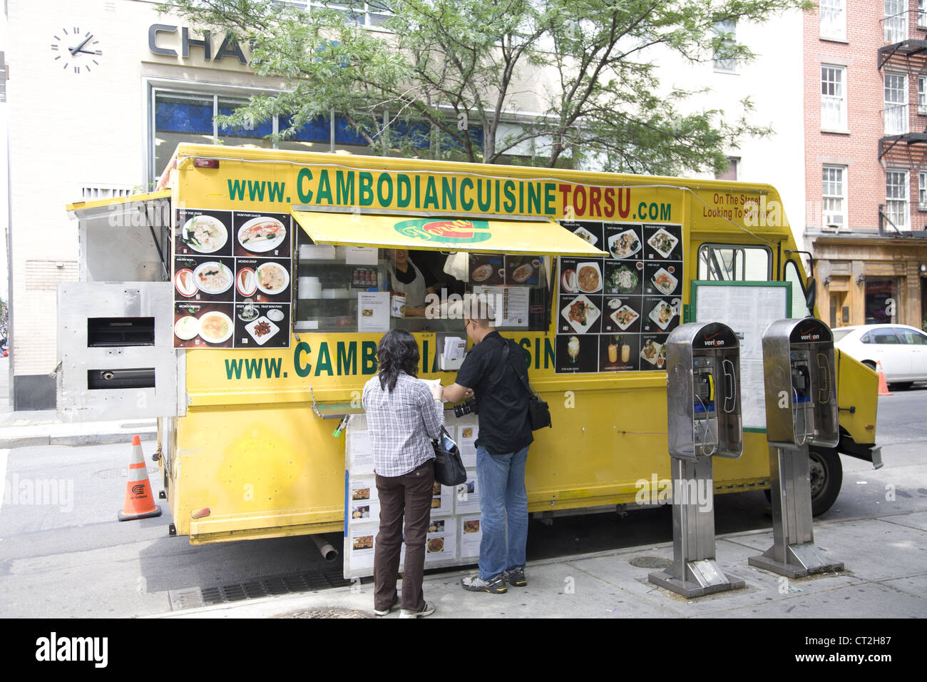 Gourmet food vendor trucks are common in NYC like this Cambodian Cuisine truck parked on a street in the Village. NYC Stock Photo