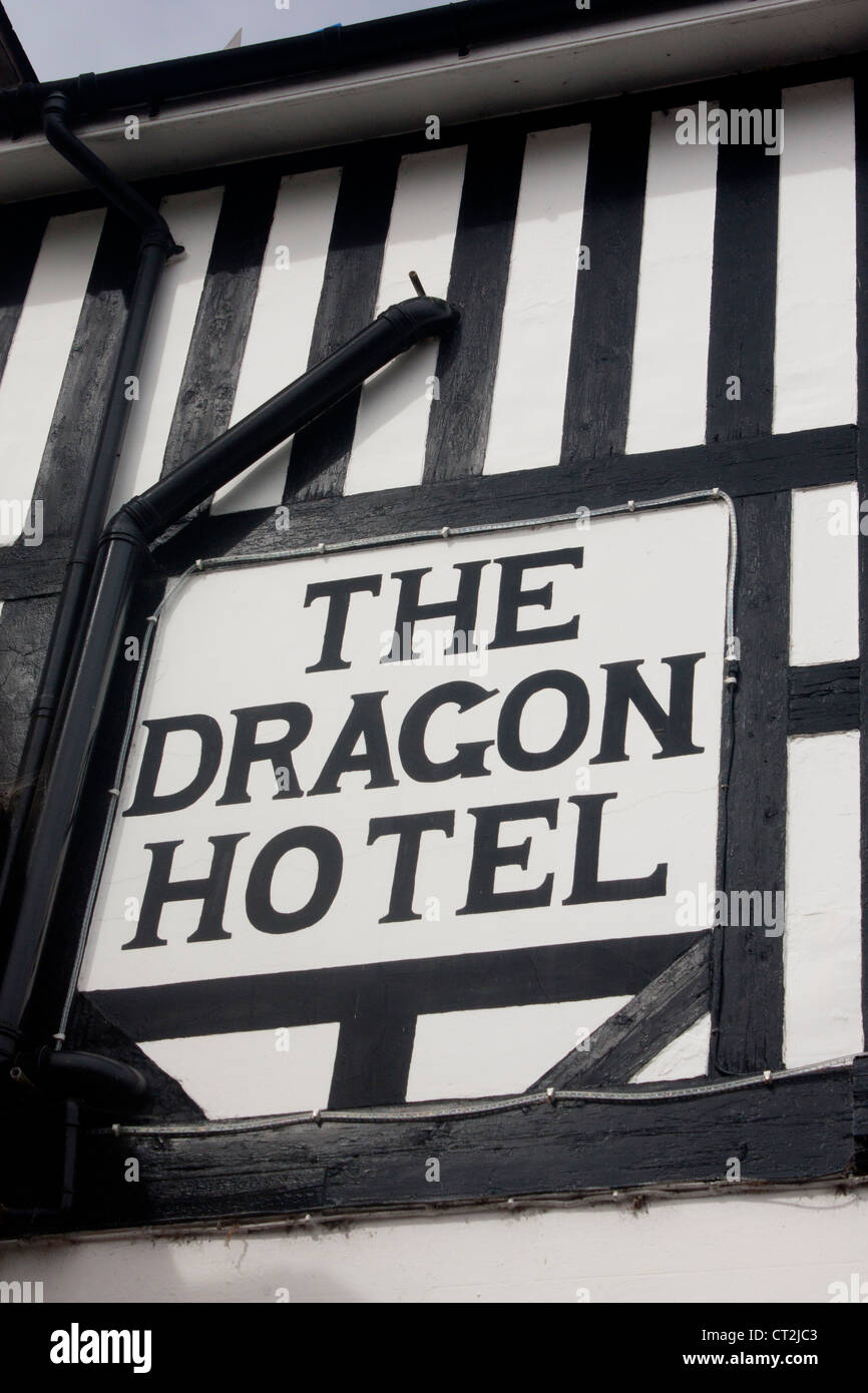 Dragon Hotel sign Abstract of black and white half-timbered building typical of Border / Marches area Montgomery Powys Wales UK Stock Photo