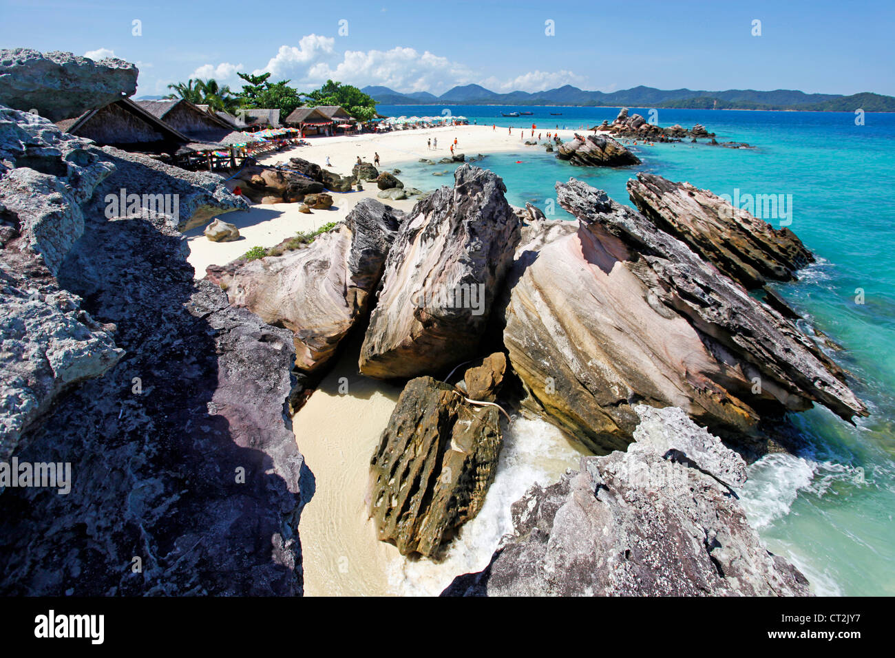 Rocks on the tropical sandy beach of Khai Nai Island, Phuket, Thailand Stock Photo