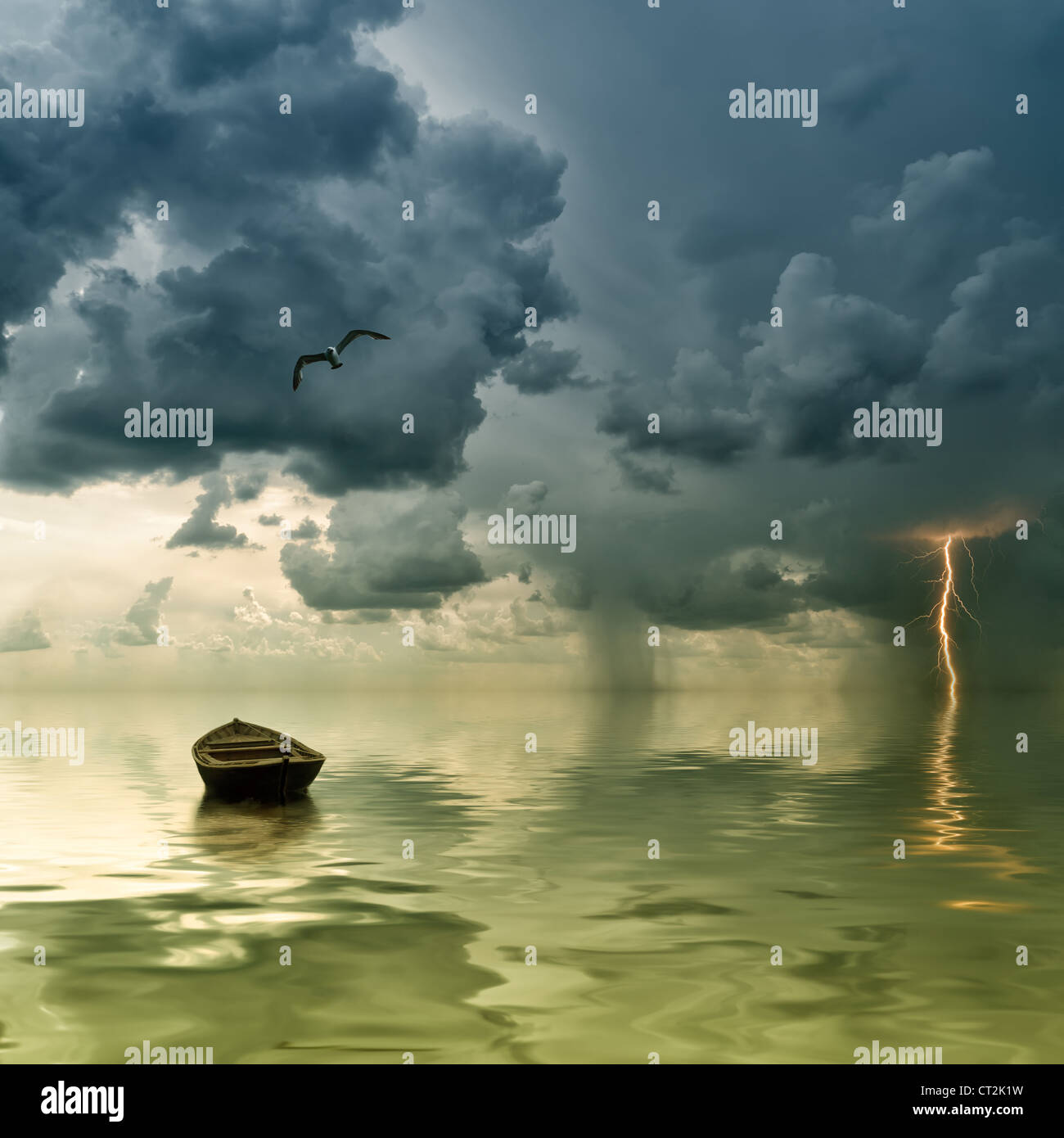 The lonely old boat at the ocean, comes nearer a thunder-storm with rain and lightning on background Stock Photo