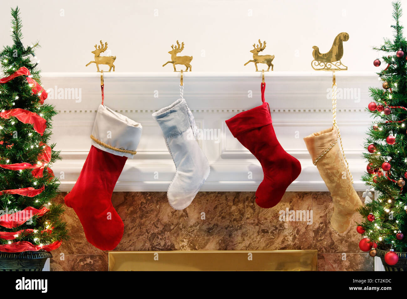 Christmas Stockings Hanging By The Fire Stock Photo Alamy