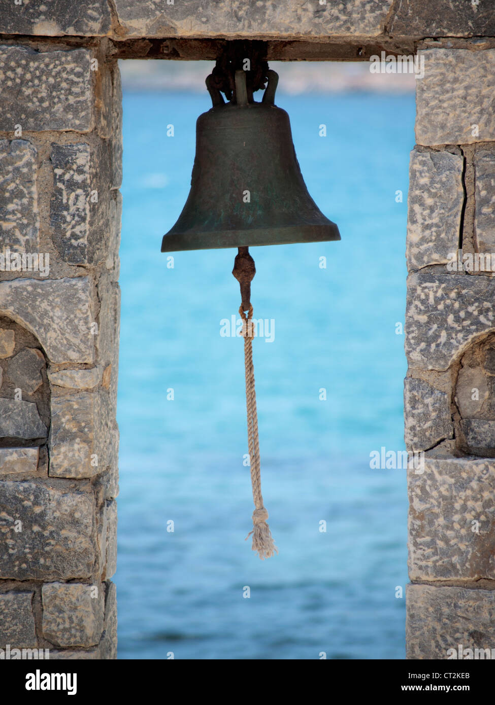 A bell by the sea in Greece Stock Photo Alamy