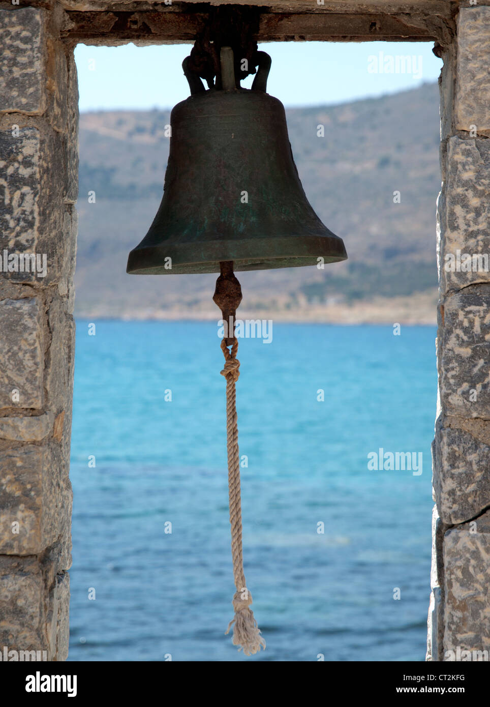 A bell by the sea in Greece Stock Photo Alamy