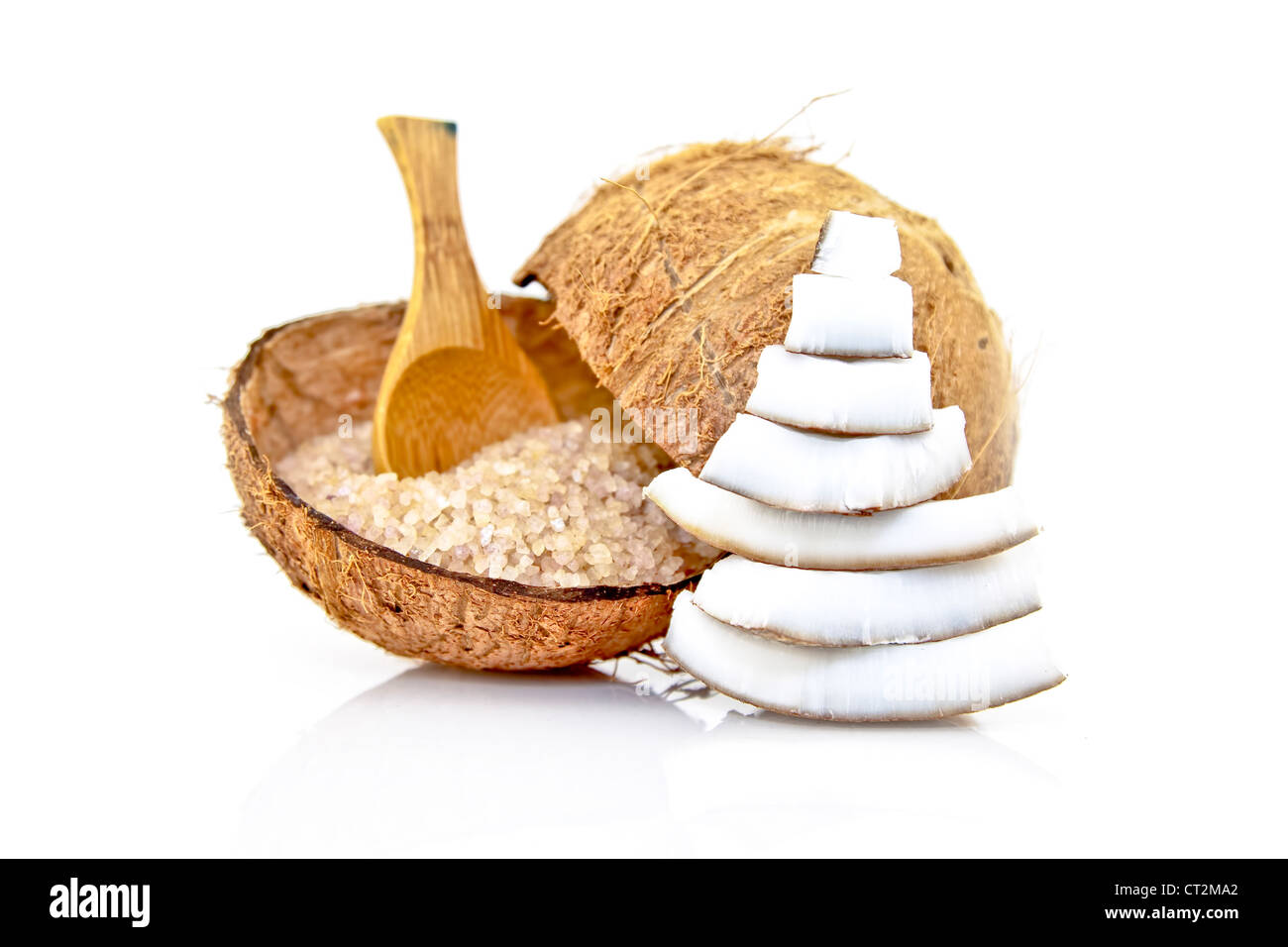 coconut spa salt in coconut shell with wooden spoon Stock Photo