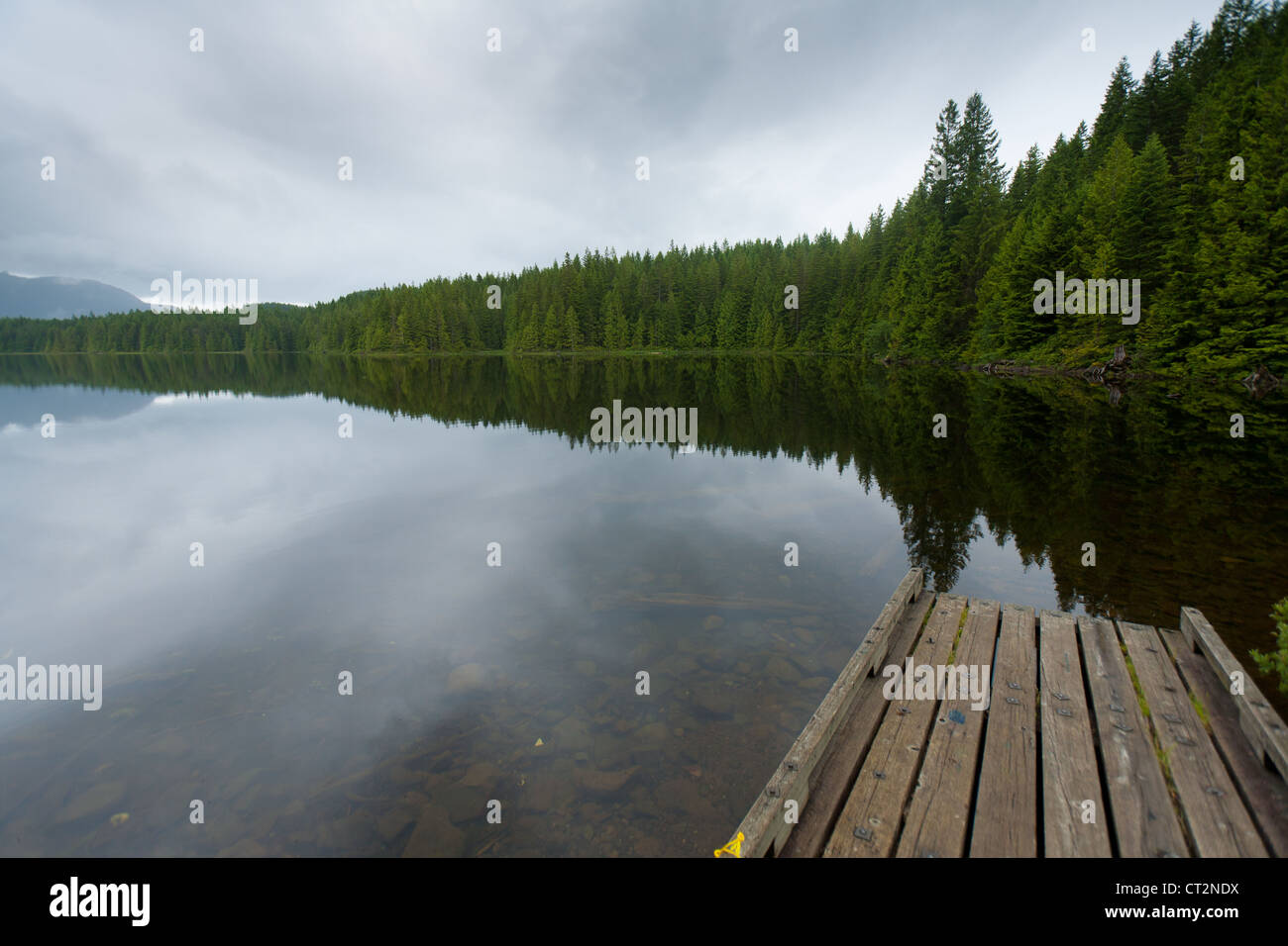 Dark clouds loom over Twin Lakes on Vancouver Island. Stock Photo