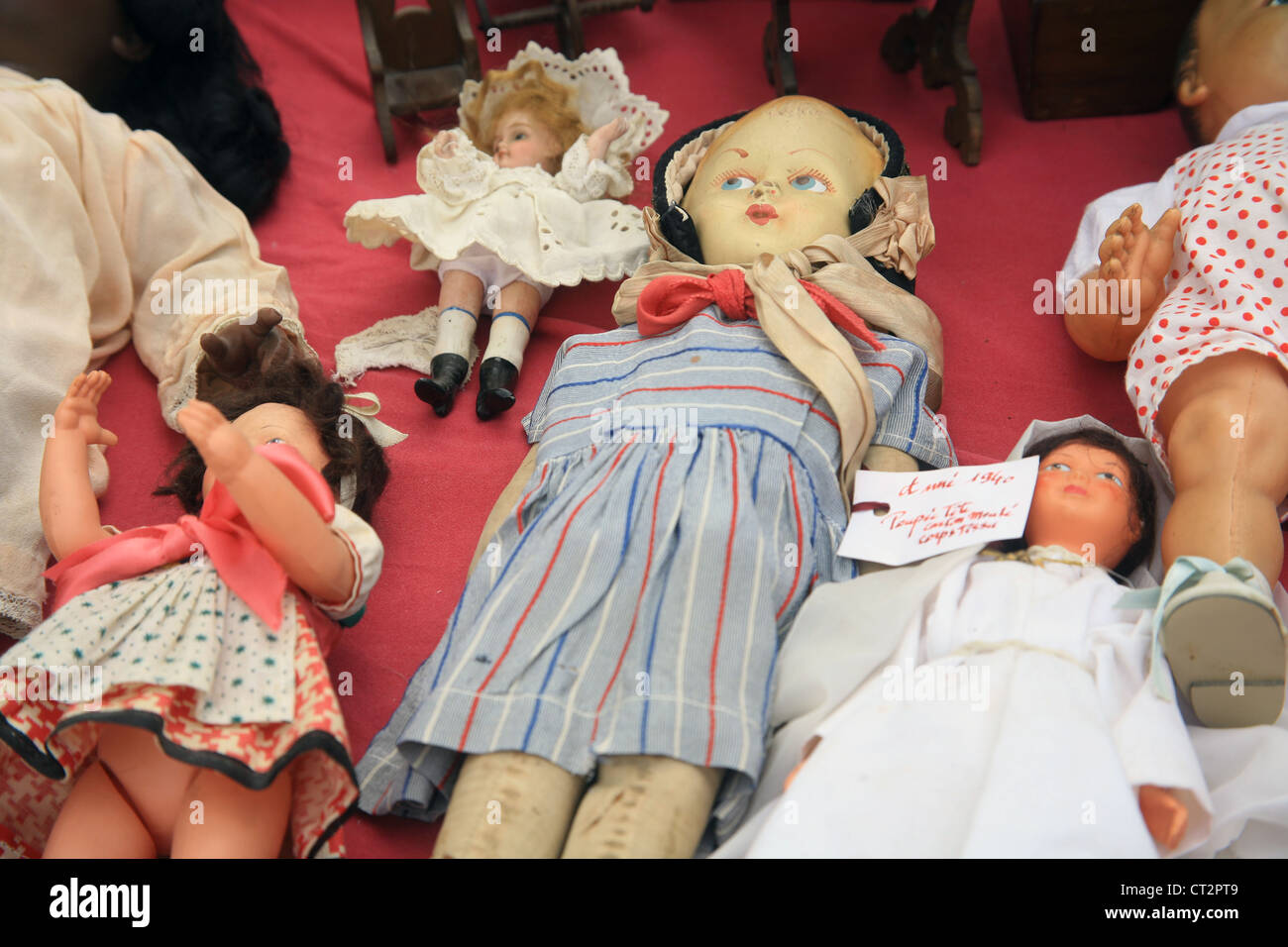 Antique Dolls for sale at a Flea Market, France Stock Photo Alamy
