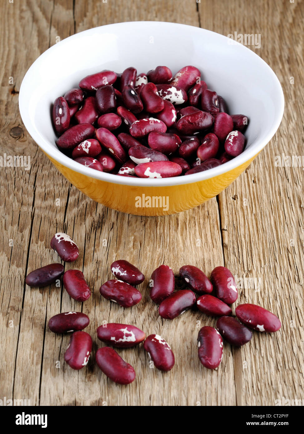 Beans in bowl on wooden background Stock Photo