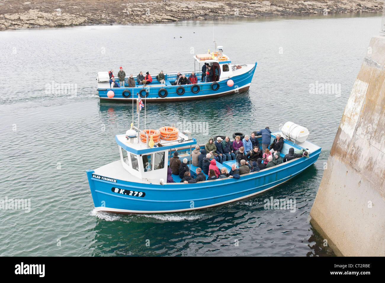 Seahouses Harbour with the boats for the Farne Islands Stock Photo - Alamy