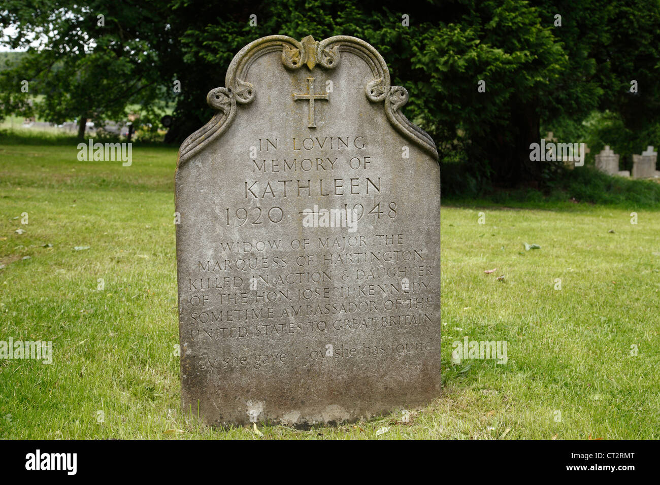 The grave of Kathleen Kennedy (sister of John F Kennedy) in the Churchyard at Edensor, Derbyshire, England, U.K. Stock Photo