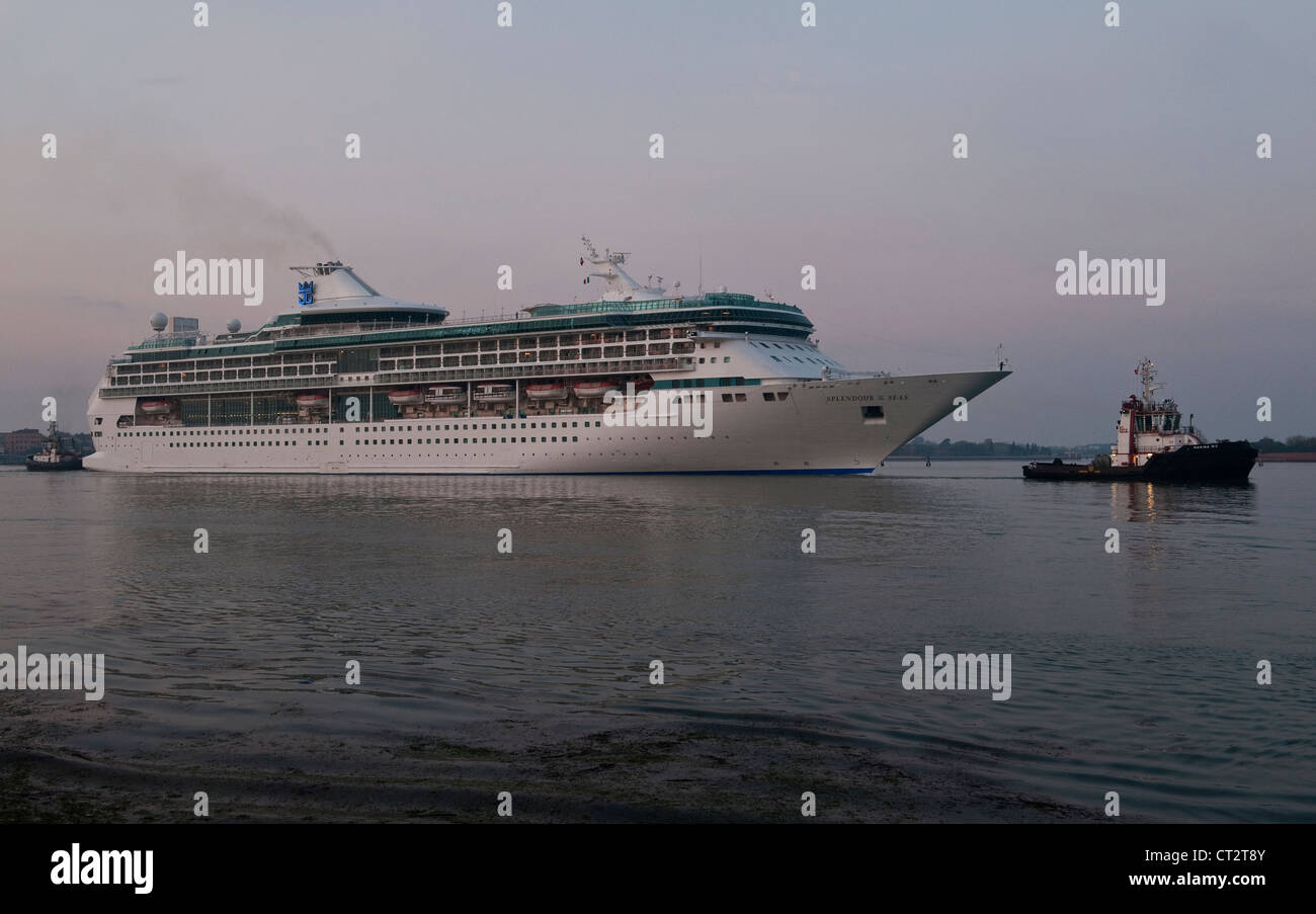 The cruise ship Splendour of the Seas enters Venice, Italy, at dawn. The ship now belongs to Marella Cruises under the name Marella Discovery Stock Photo