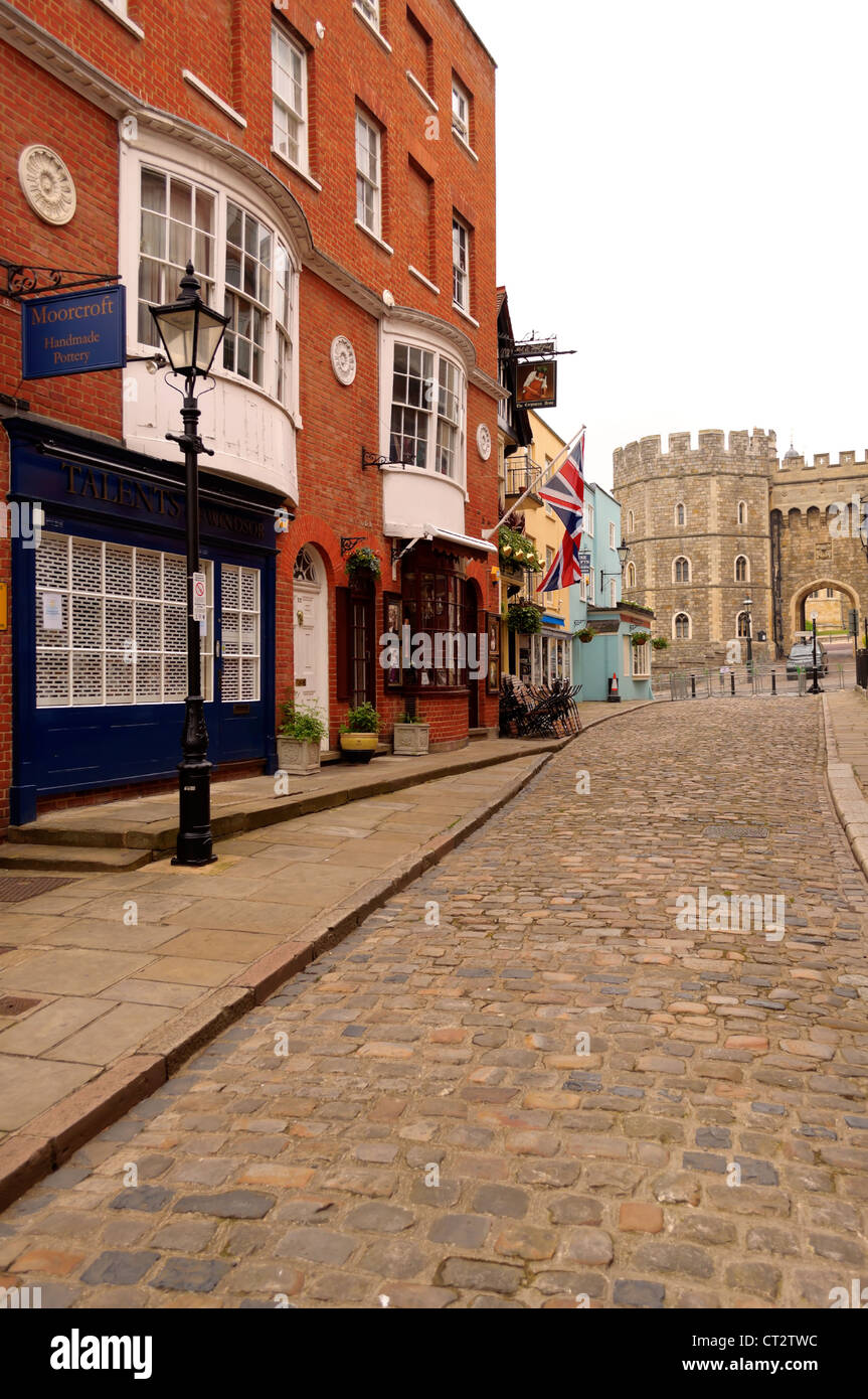 Windsor, England - May 19th, 2012: Windsor Castle entrance and Church Street in the Royal Borough of Windsor Berkshire England. Stock Photo