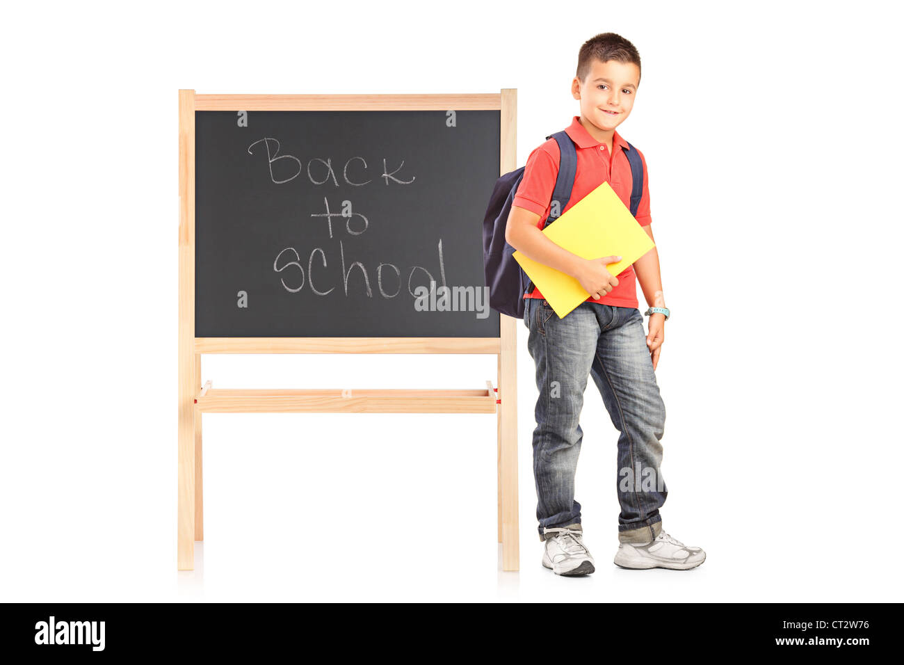 Full length portrait of a school boy with backpack and notebook ...