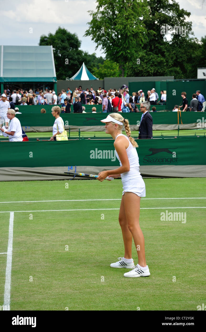 Girl's match on outside courts at The Championships 2012, Wimbledon, Merton Borough, Greater