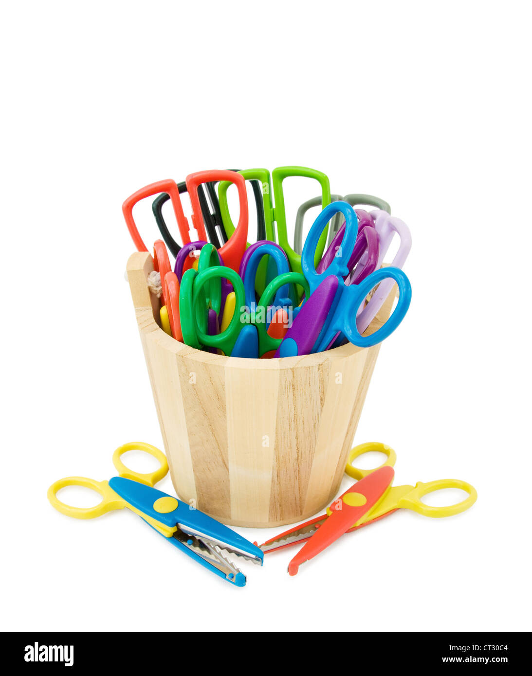 Colorful crafts scissors in wooden bucket. Isolated over white ...