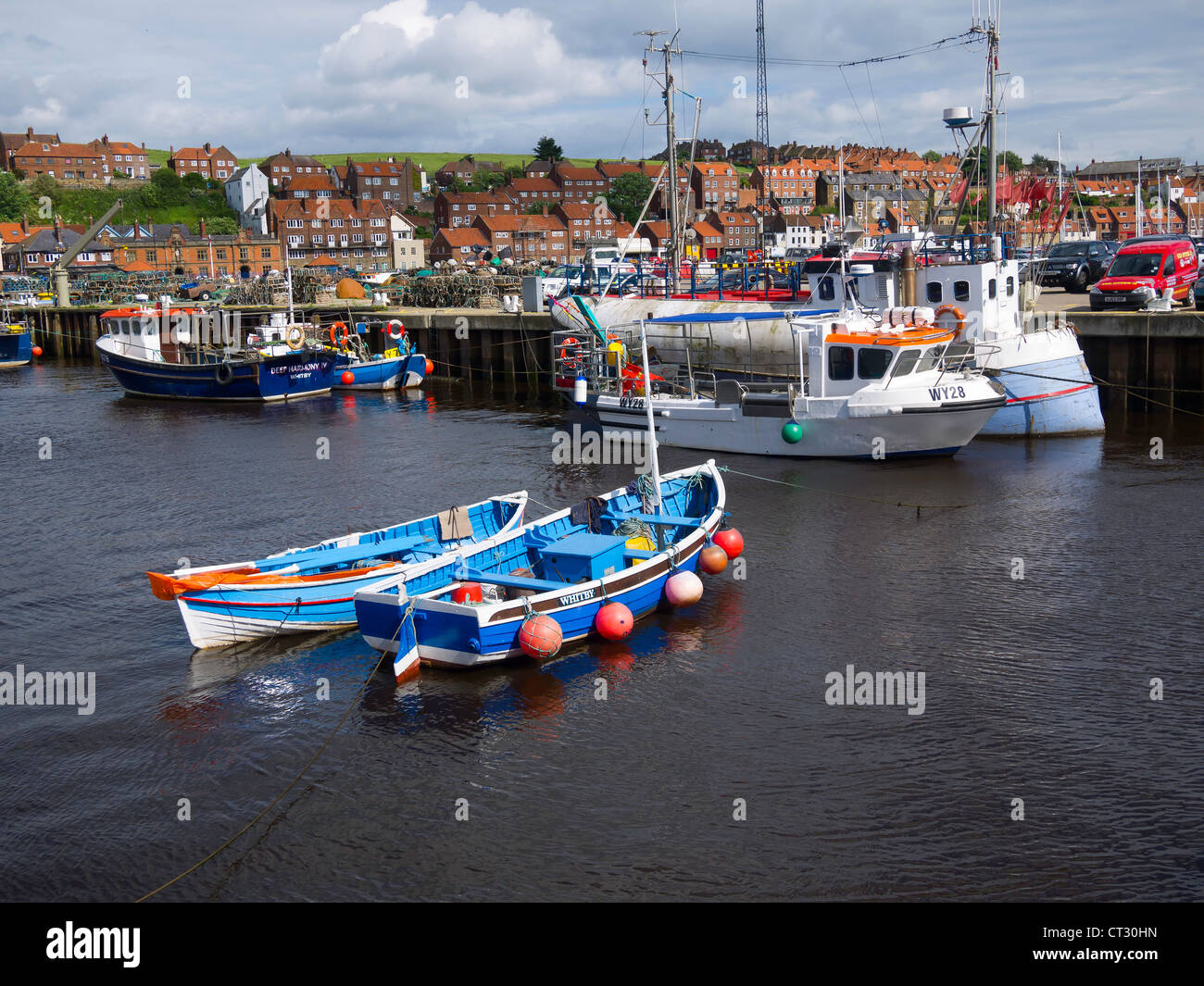 Fishing boats at Endeavour Wharf in Whitby harbour North Yorkshire UK ...