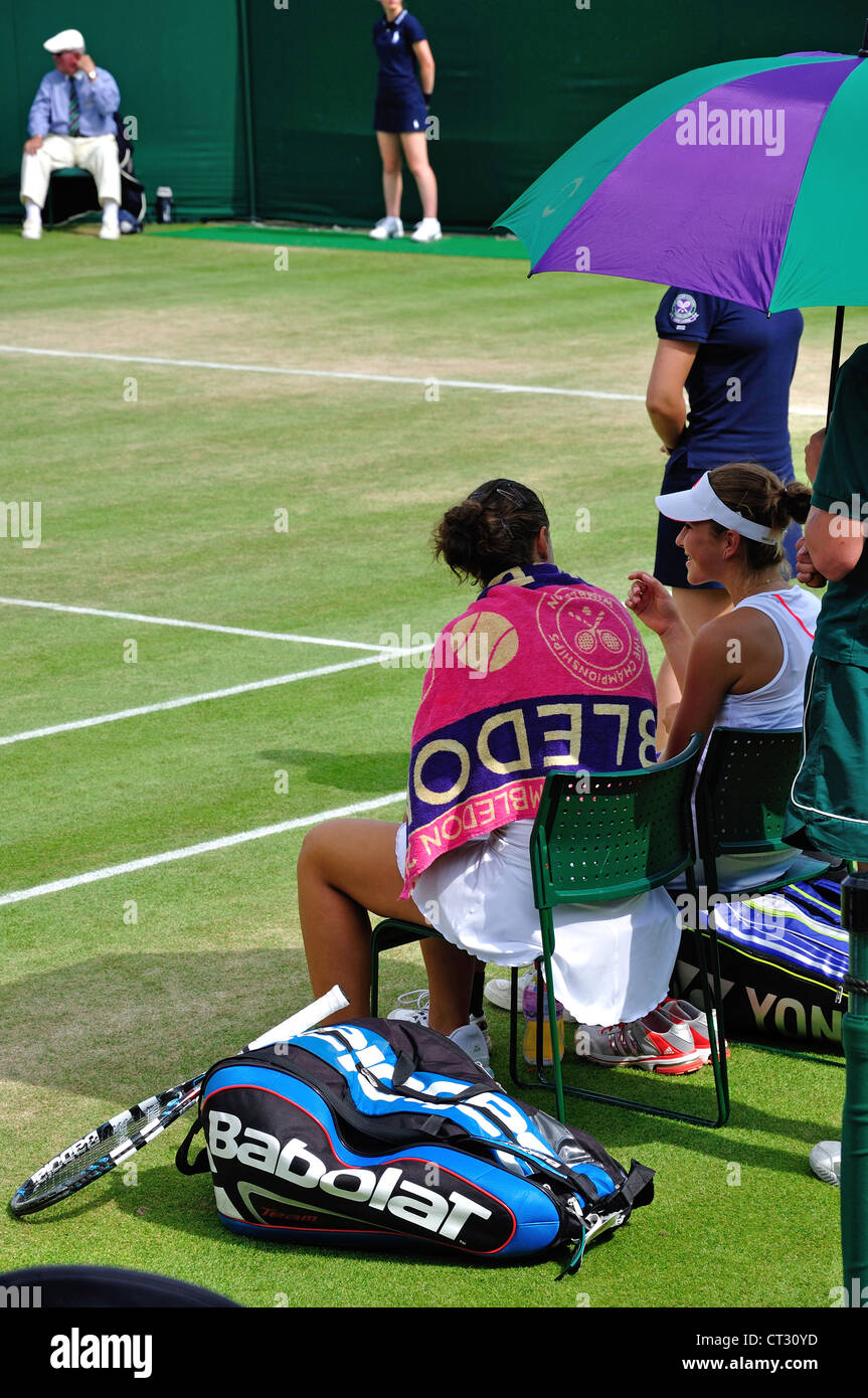 Girl's match on outside courts at The Championships, Wimbledon, Merton