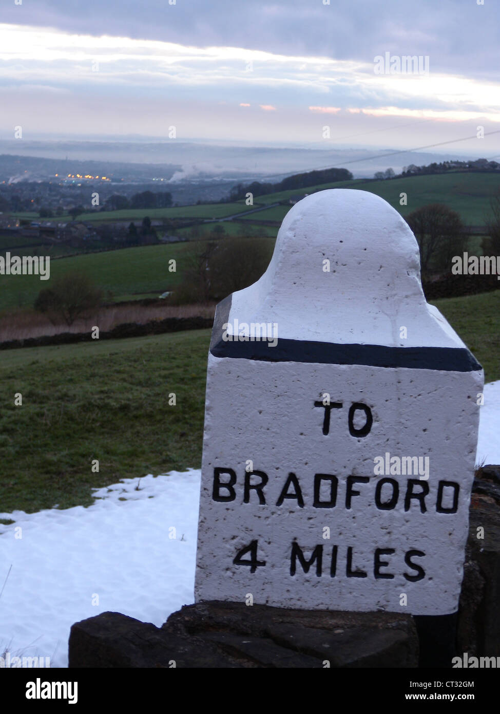 Sign post to Bradford from Queensbury Stock Photo