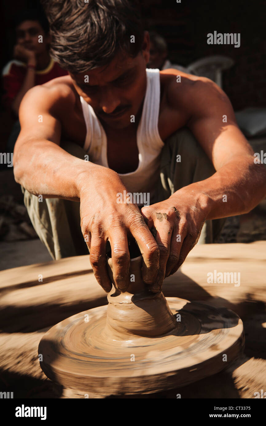 Potter At Work, Saijpur Ras, Gujarat, India Stock Photo