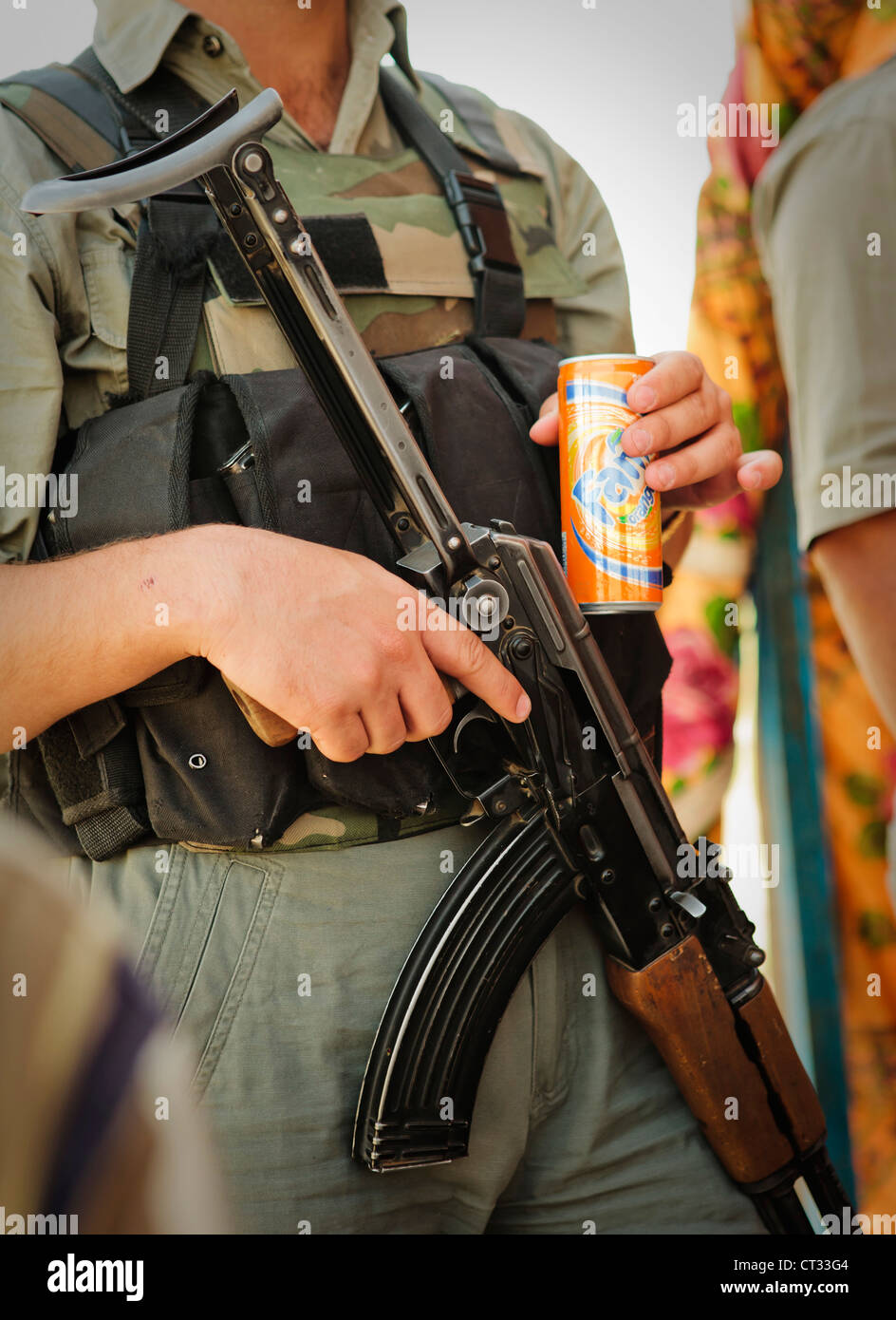 Special forces security drinking soda at political rally, As-Sulaymaniyyah, Iraq Stock Photo