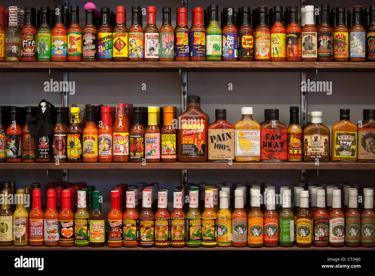 Pepper Sauces on show in a store Stock Photo Alamy