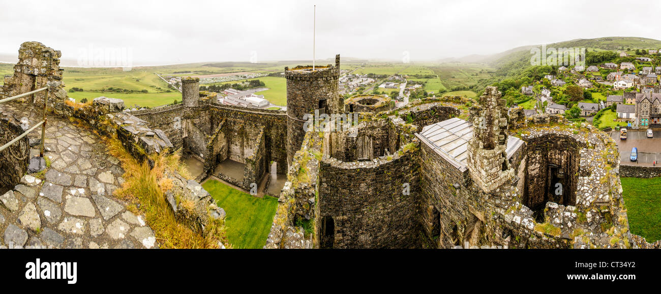 HARLECH, Wales - North-facing panorama of towers at Harlech Castle in Harlech, Gwynedd, on the northwest coast of Wales next to the Irish Sea. The castle was built by Edward I in the closing decades of the 13th century as one of several castles designed to consolidate his conquest of Wales. Stock Photo