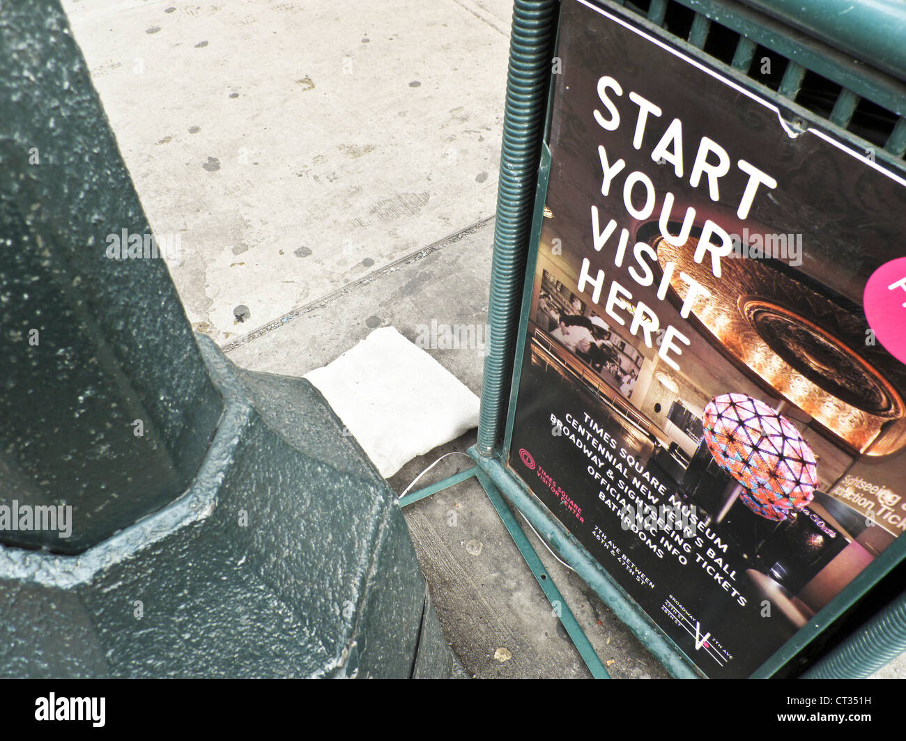 poster with tourist information attached to side of trash receptacle on 8th Avenue near Times Square New York City Stock Photo