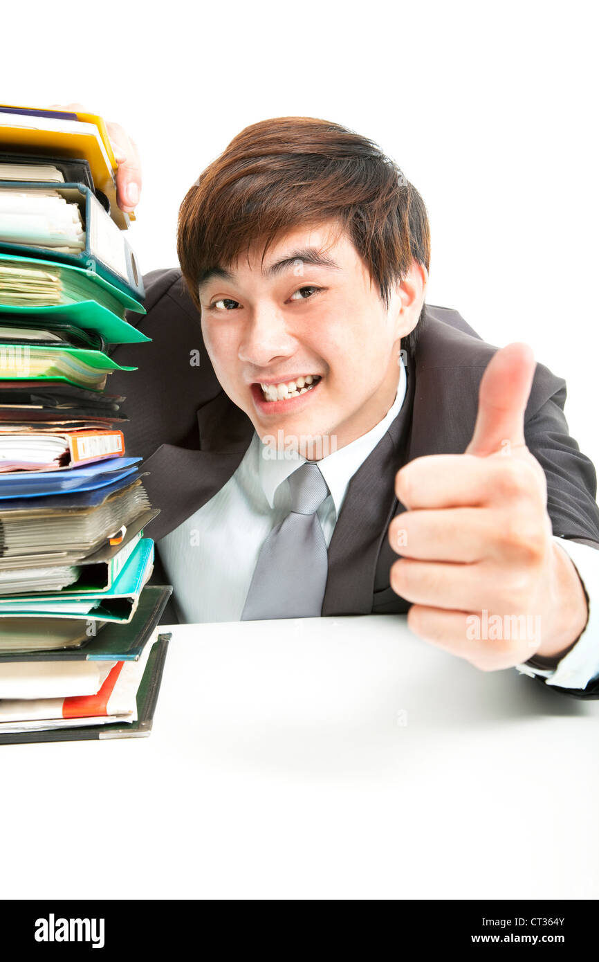 successful businessman with thumbs up in the office Stock Photo