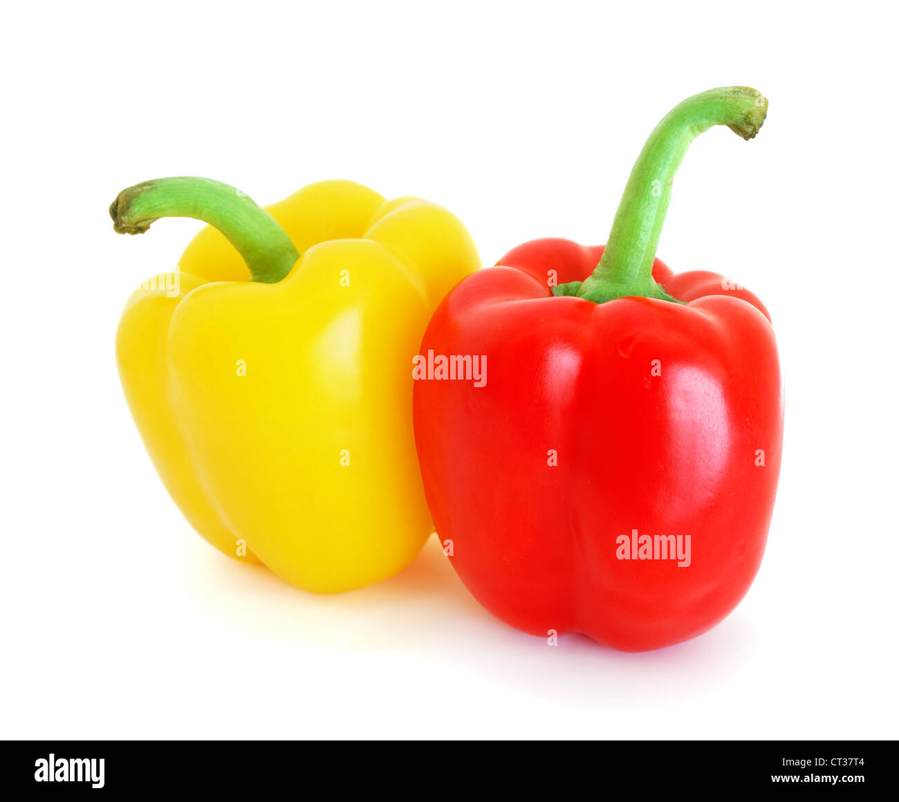 Red and yellow bell peppers isolated on white background Stock Photo ...