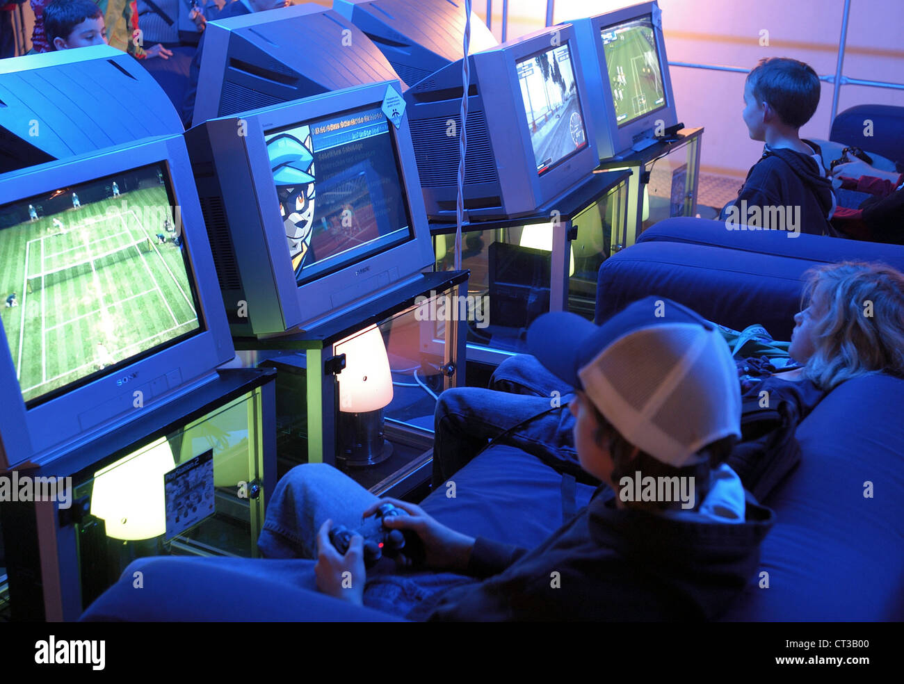 Children play on a Playstation Stock Photo